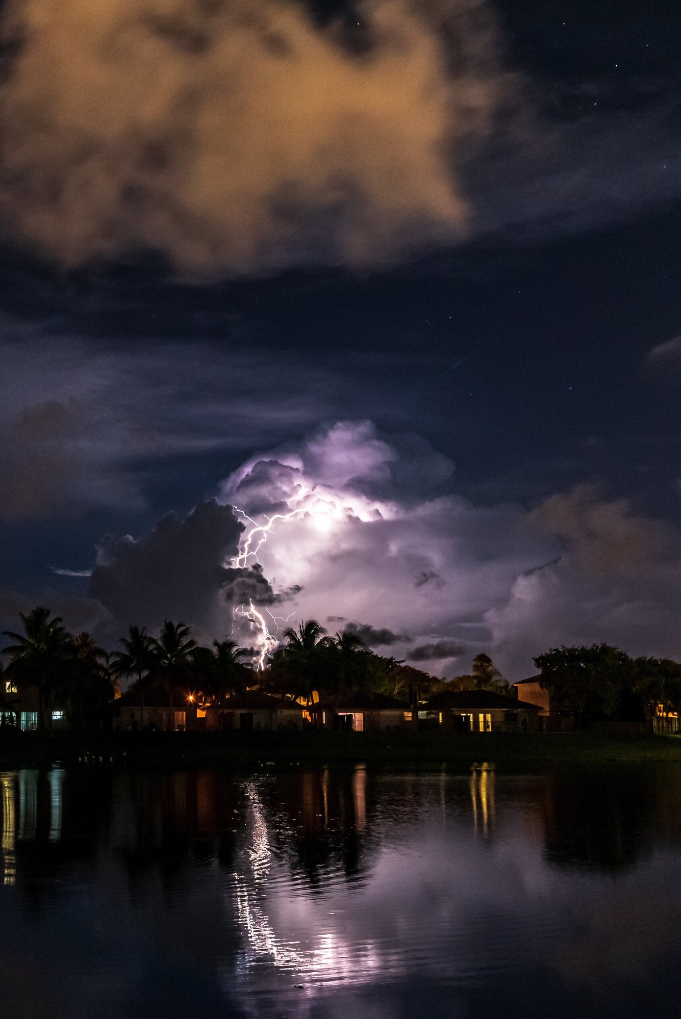 lightning-amongst-the-storm-clouds-is-reflected-in-2024-10-18-06-30-32-utc